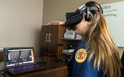Nursing student using a virtual reality headset