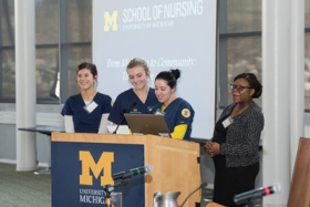 Nursing students present Students' Choice Award with Dr. Rosemberg.