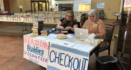 Similuk and Catie Doman get organized for the book sale