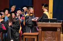Dean Hurn presented Leech with UMSN's Teacher of the Year award at commencement